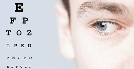 Image of man looking at eye chart.